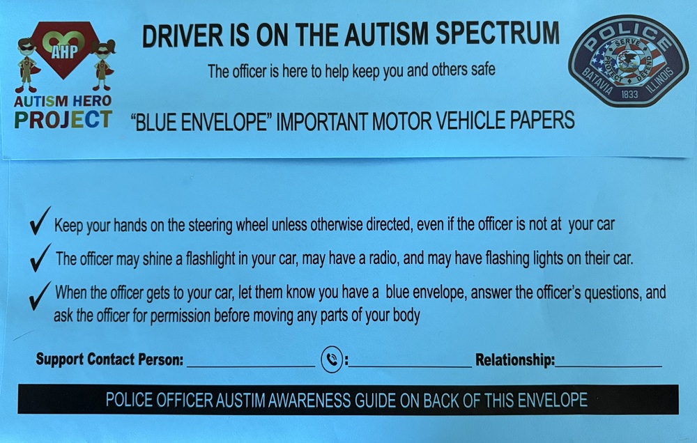 Blue envelope says driver is on the autism spectrum