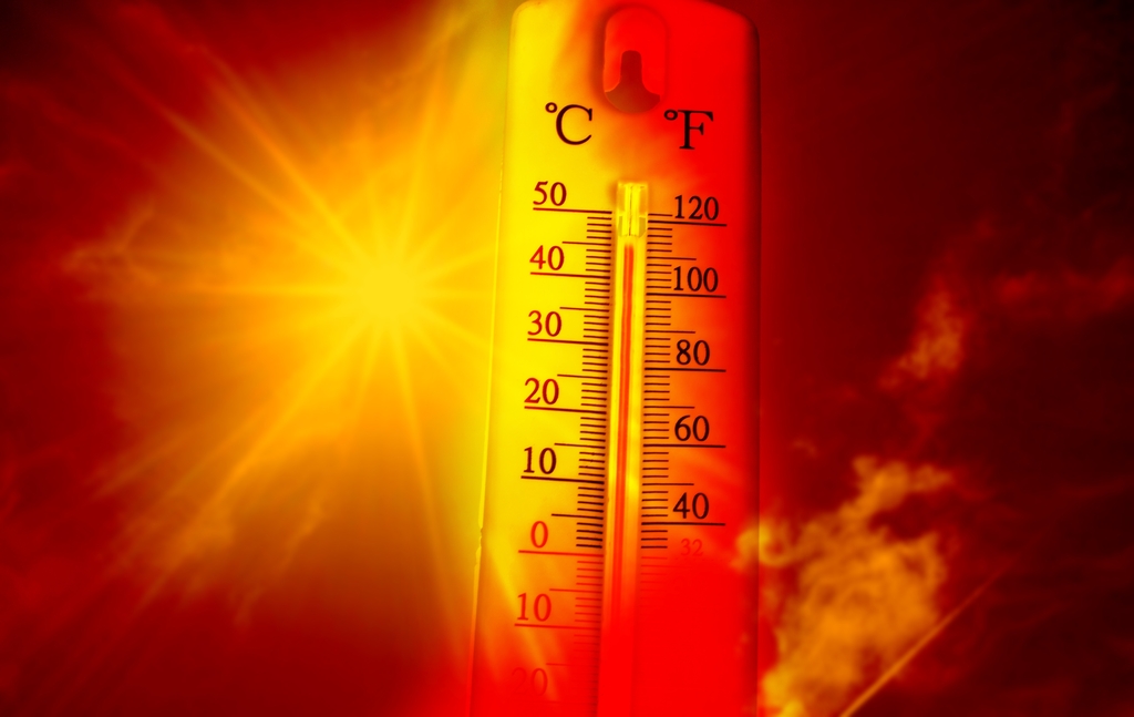 sun, thermometer reaching 110