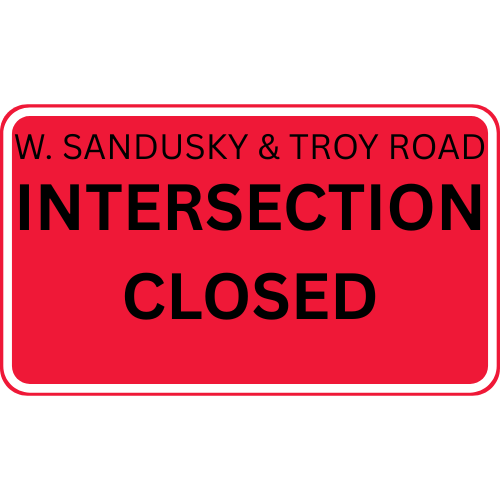 Red road sign with white border reads, "W. Sandusky & Troy Road INTERSECTION CLOSED" in bold black text, indicating a closure.
