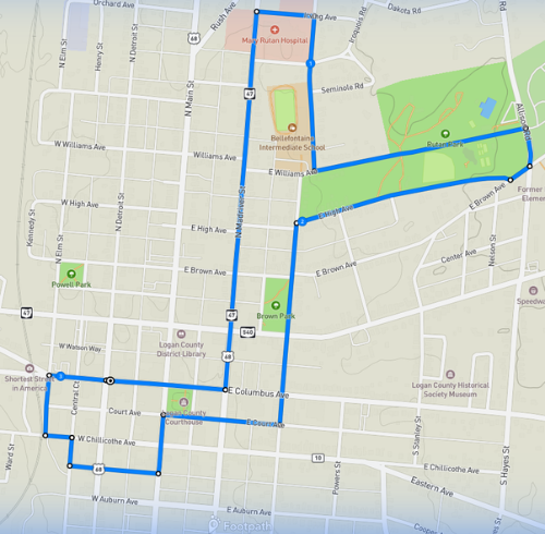 Map showing a route highlighted in blue through Bellefontaine, passing landmarks like Mary Rutan Hospital and Brown Park, with road names visible.