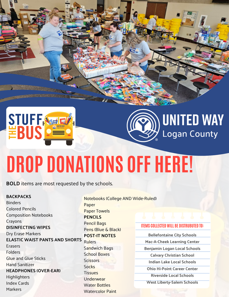 Volunteers organize school supplies on tables for the Stuff the Bus donation drive, with a list of requested items and school distribution centers.