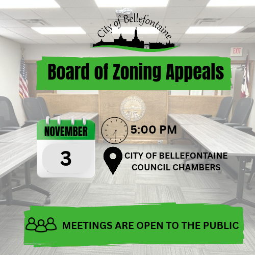 Meeting room with chairs, tables, and a flag. Calendar showing November 3. Clock shows 5:00 PM.