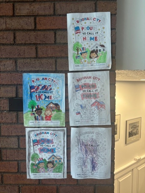 completed coloring contest submissions displayed in City Hall