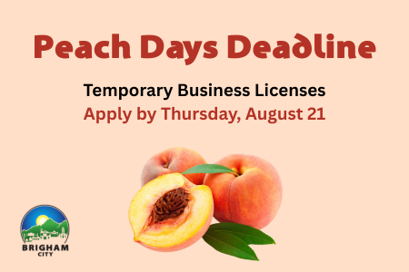 Red and black text above a group of peaches