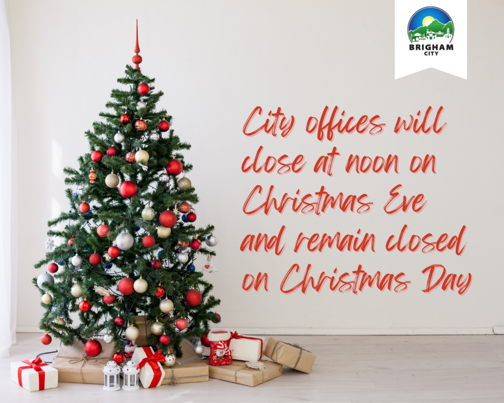 Red text against a white background, next to a Christmas tree decorated with red and gold balls