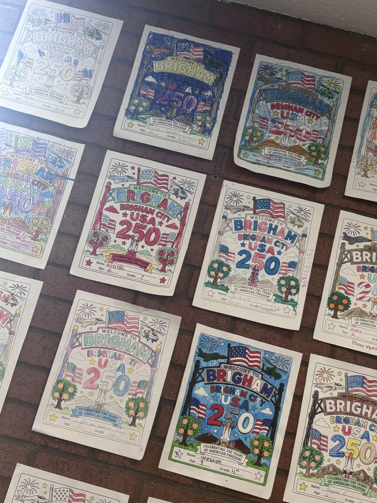 Colored entries hanging on the wall at City Hall
