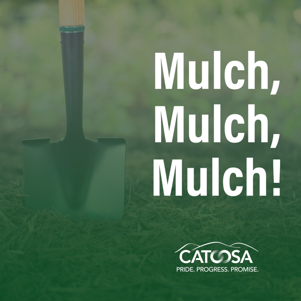 A garden shovel stands upright in green grass, with the text "Mulch, Mulch, Mulch!" prominently displayed beside it. The image features the logo "CATOOSA" along with the phrases "PRIDE. PROGRESS. PROMISE." at the bottom.