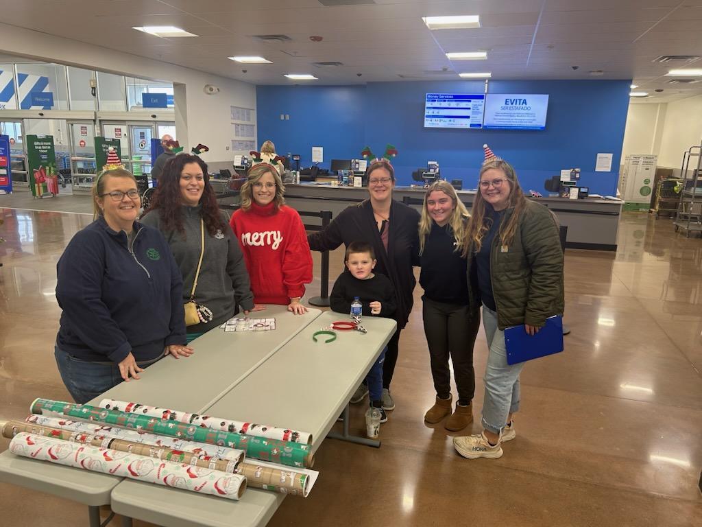 Shop with a Hero volunteer gift wrappers