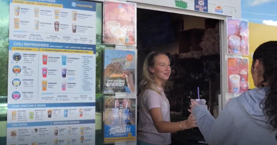 Worker serving customer