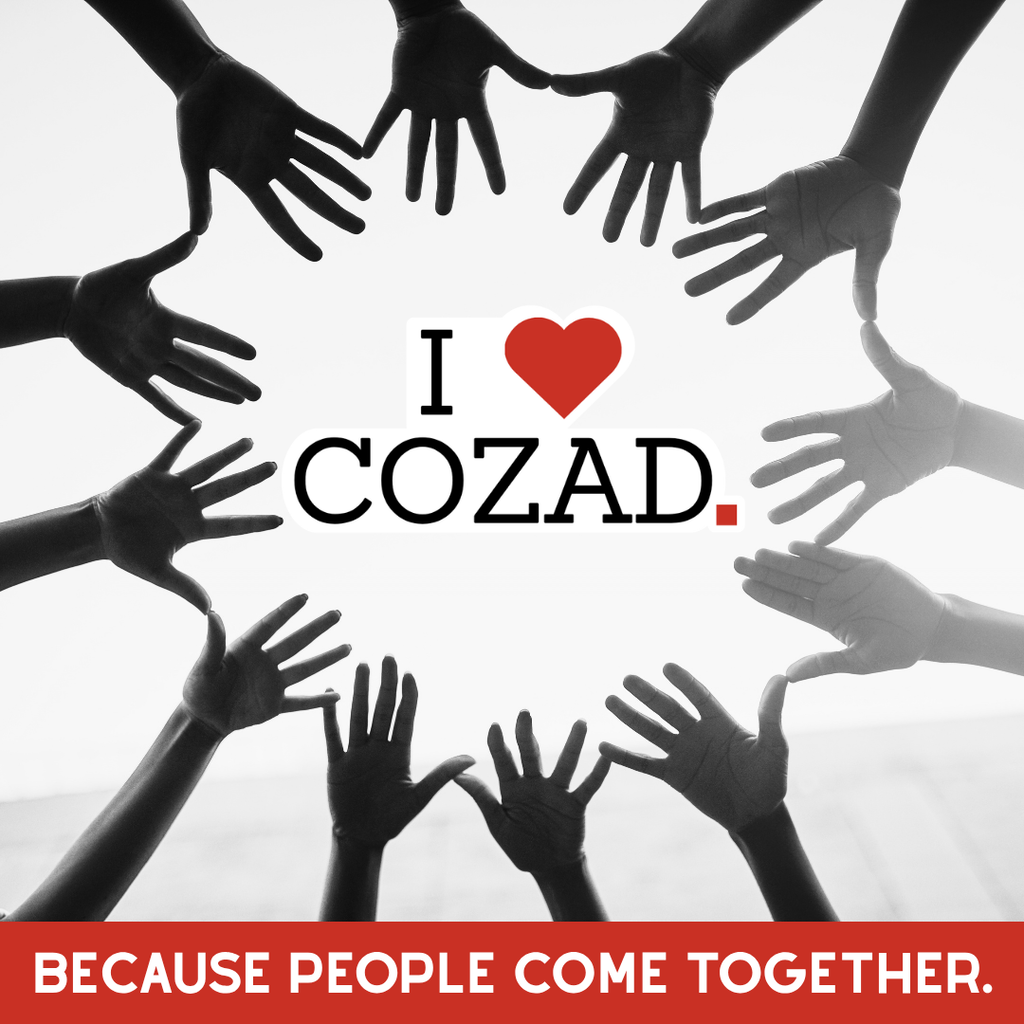 I Love Cozad. Because People Come Together. Graphic with hands reaching in to help.