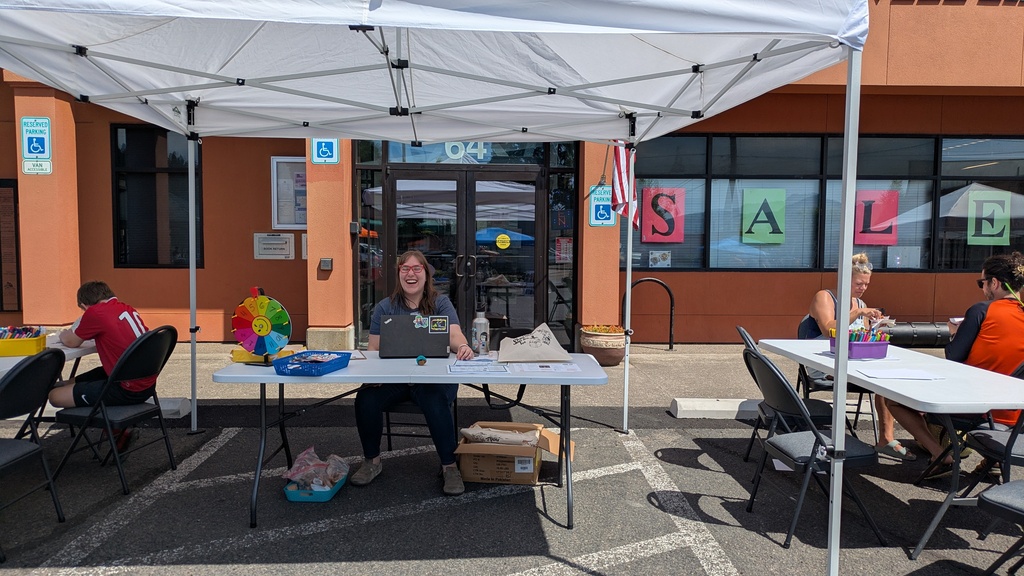 Image of the Creswell Library Booth at the Farm to Table Event