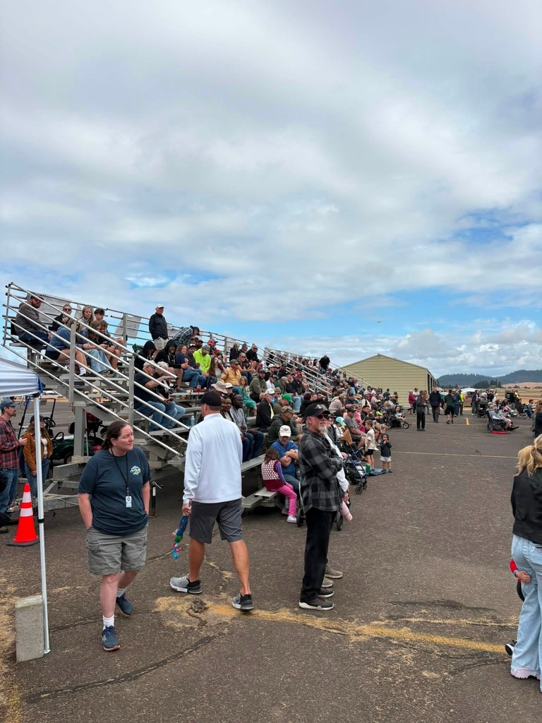 Image of event-goers in the stands as they await the beginning of the Creswell STOL'n Out West event.