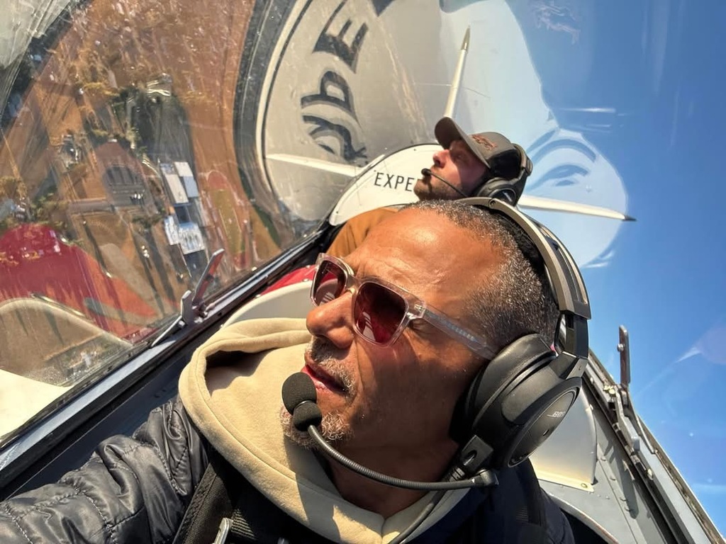 Image of two pilots in their plane as they fly in the Creswell STOL event