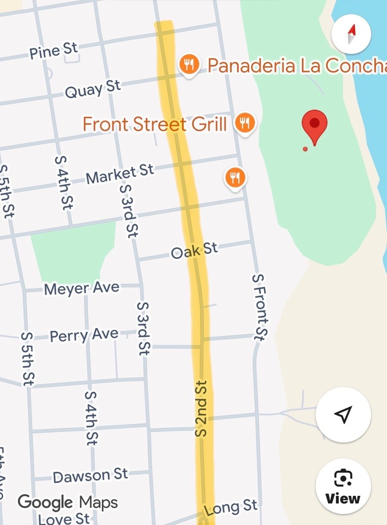 Map screenshot showing a highlighted section of South 2nd Street in Dardanelle indicating a construction area. The highlighted route runs north–south from Long Street past Oak Street, Market Street, and Front Street, toward Pine Street. Nearby streets such as S 3rd Street, S 4th Street, and S Front Street are visible, along with landmarks like Front Street Grill and Panadería La Concha near the riverfront park area. The highlighted section marks the area affected by the construction project.