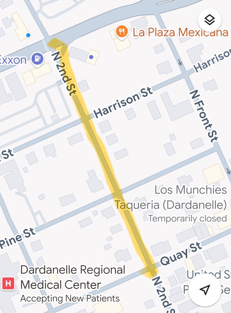Map of downtown Dardanelle showing a highlighted yellow construction zone along North 2nd Street, extending from Quay Street north to the bridge near Harrison Street. Nearby landmarks include La Plaza Mexicana, Dardanelle Regional Medical Center, and nearby side streets such as Pine Street and North Front Street.