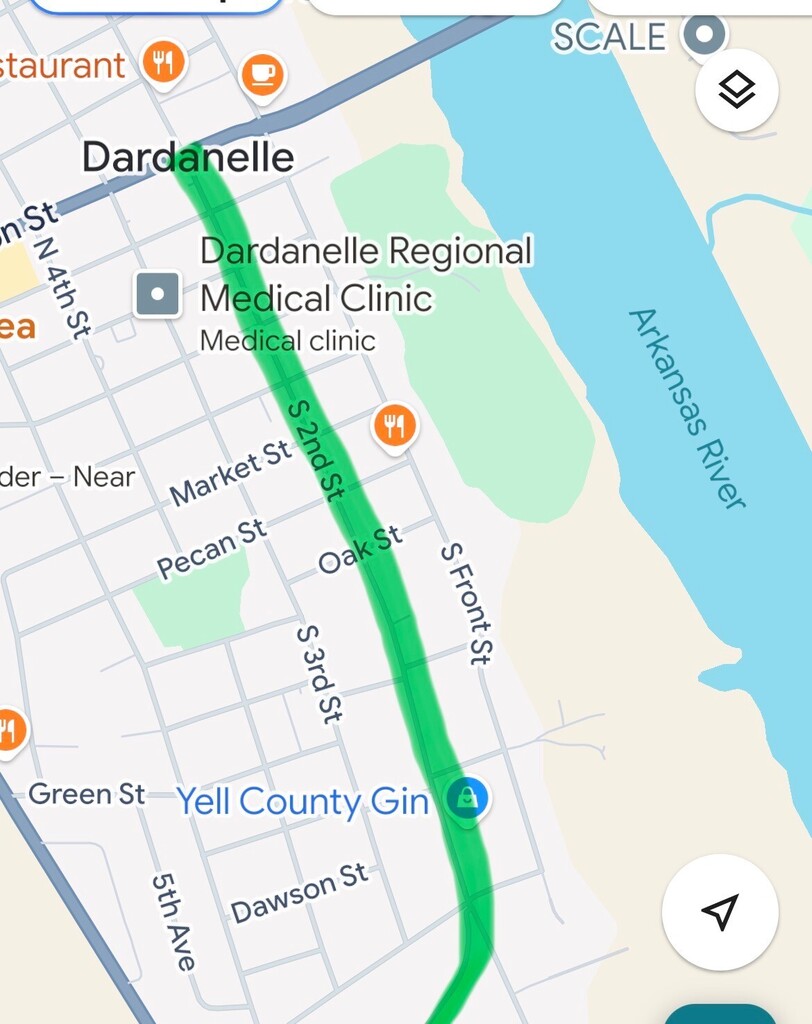 Screenshot of a map of Dardanelle, Arkansas, showing South 2nd Street highlighted in bright green from Union Street southward along the Arkansas River. Nearby landmarks include Dardanelle Regional Medical Clinic and Yell County Gin, with surrounding streets labeled including Market Street, Oak Street, and Dawson Street.
