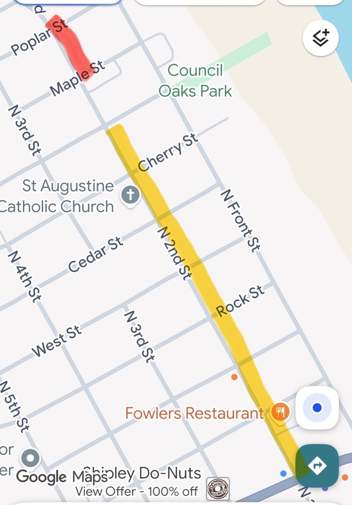 Google Maps screenshot showing construction on North 2nd Street, with a red road closure between Maple Street and Poplar Street and a yellow construction zone extending south through downtown.