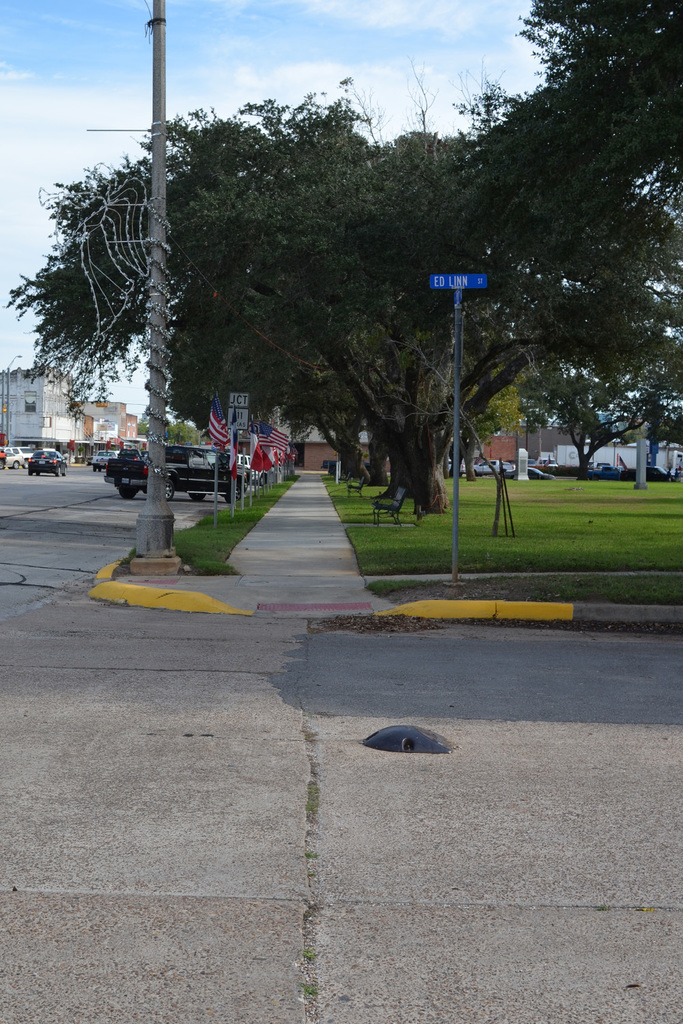 Old stop sign base at Ed Linn Street and Main Street