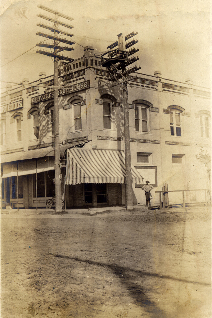 1909 electric poles by Faires Drug Store