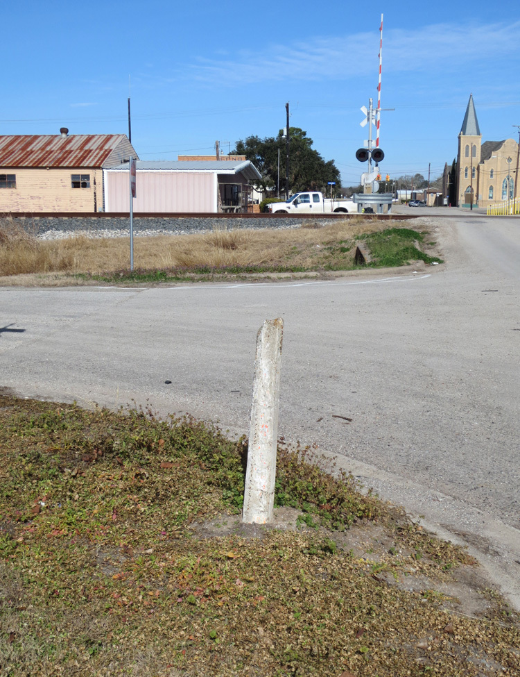 Concrete street marker by Jackson County Feed