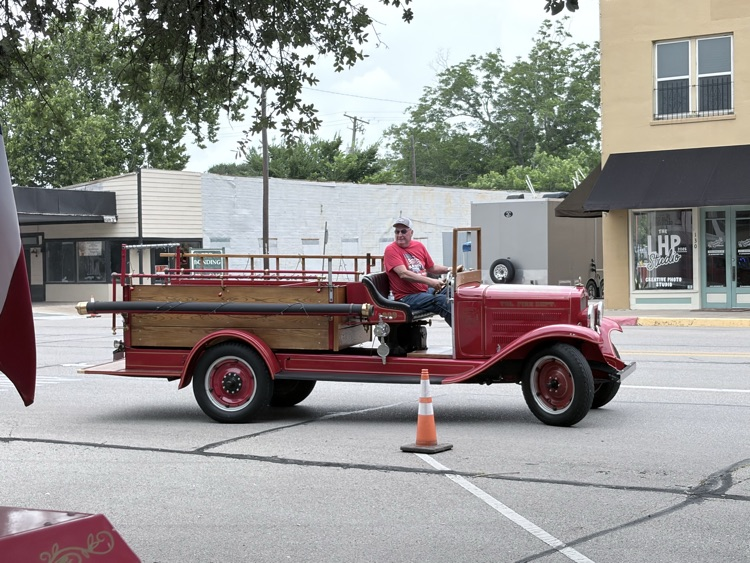 Gary Broz drives the 1929 fire truck 