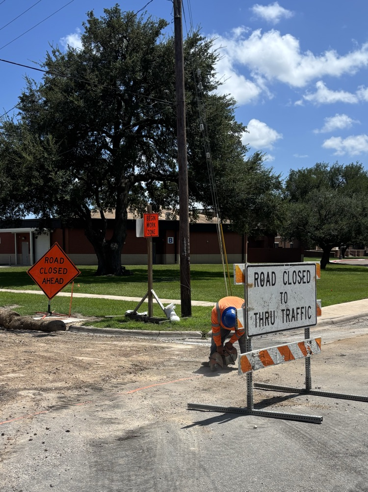 Work continues on Miracle Drive by Edna High School .