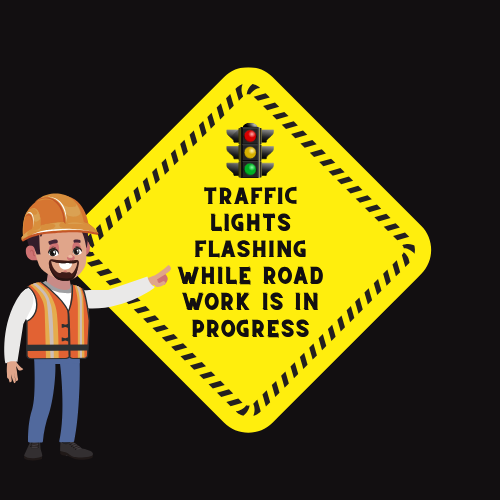 highway worker stoplight traffic lights flashing while road work is in progress.