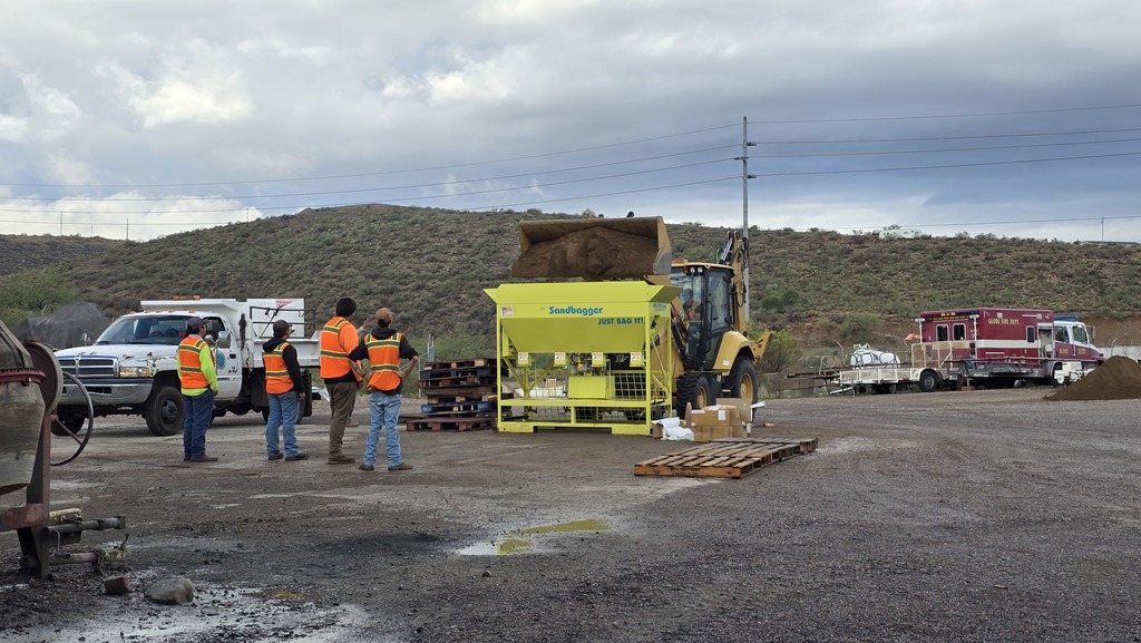 Photo of staff filling sand bags