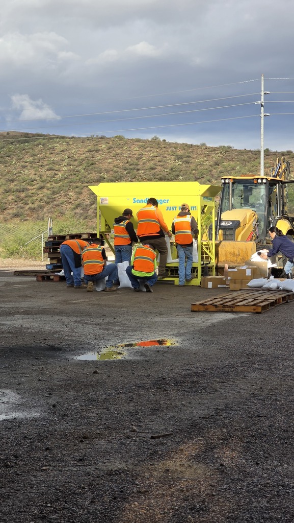 Photo of staff filling sand bags