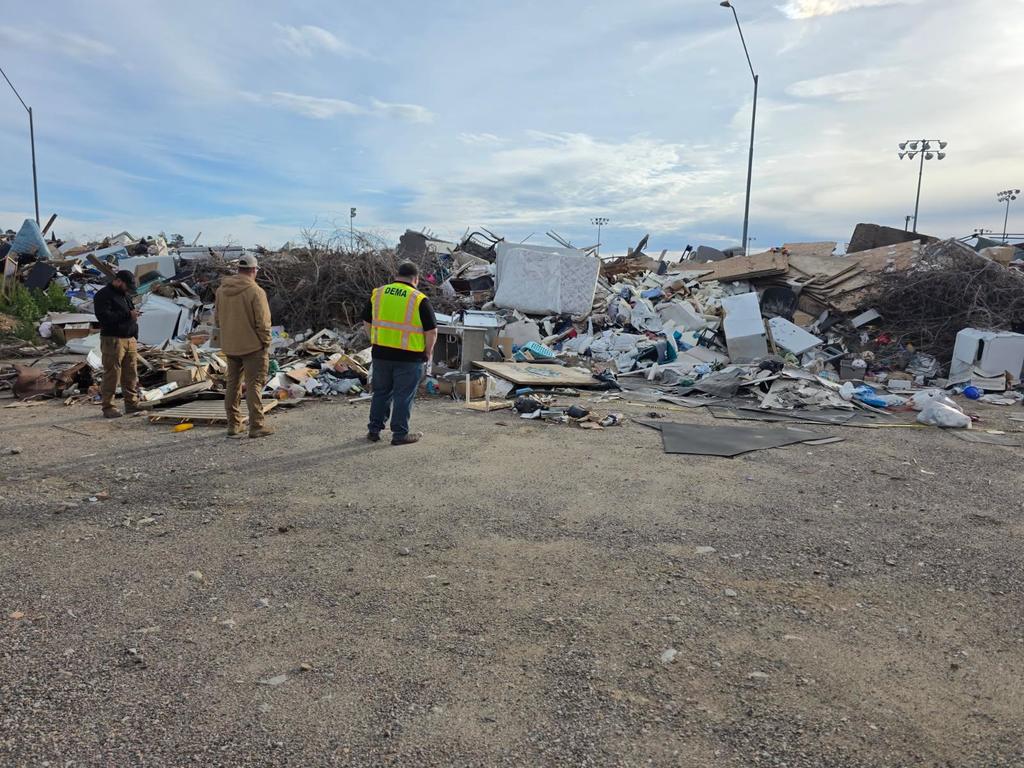 FEMA, DEMA, and City of Globe Staff assessing flood damage