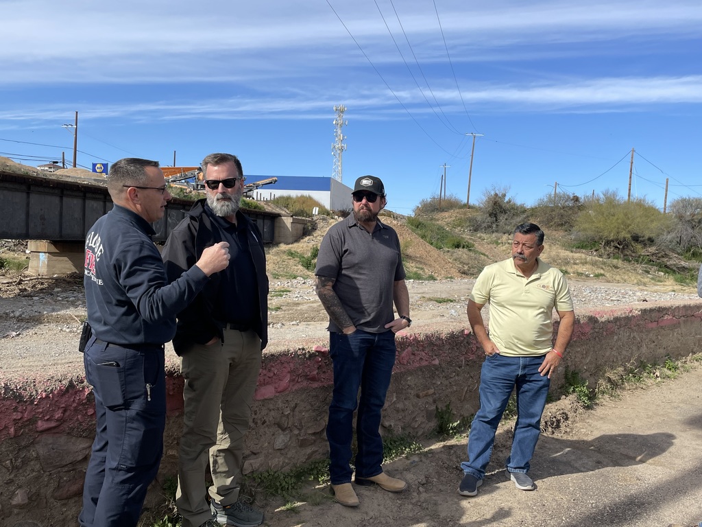 Chief Gary Robinson, Associate Administrator of FEMA's Office of Response and Recovery, Gregg Phillips, Congressman Eli Crane, and Mayor Al Gameros review damage on-site. 