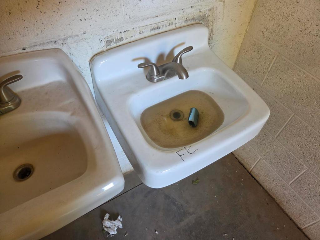Photo of sink that has been damaged