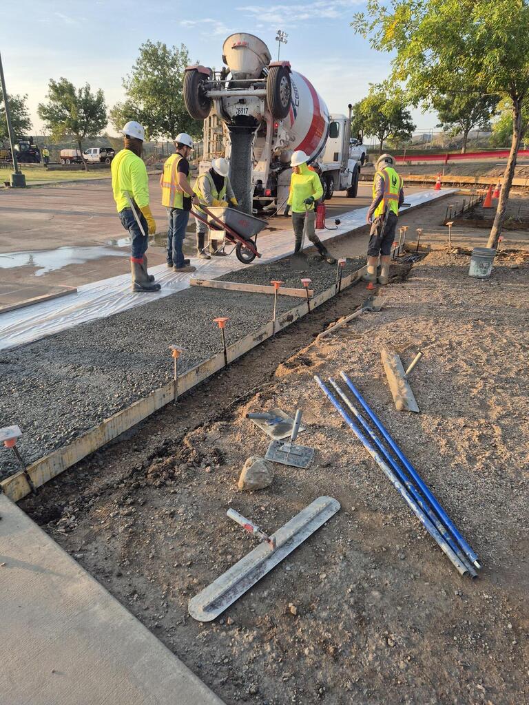 Beginning to pour sidewalk slab