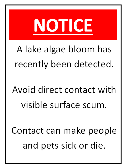 Notice Sign about a lake algae bloom at Eagle Scout Lake