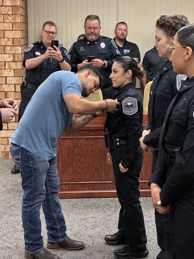 GIPD Administration swearing in four new officers