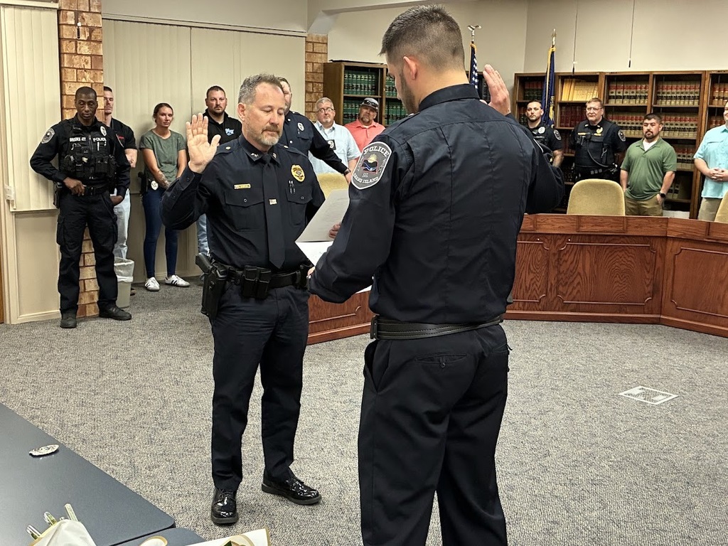 GIPD Administration swearing in four new officers