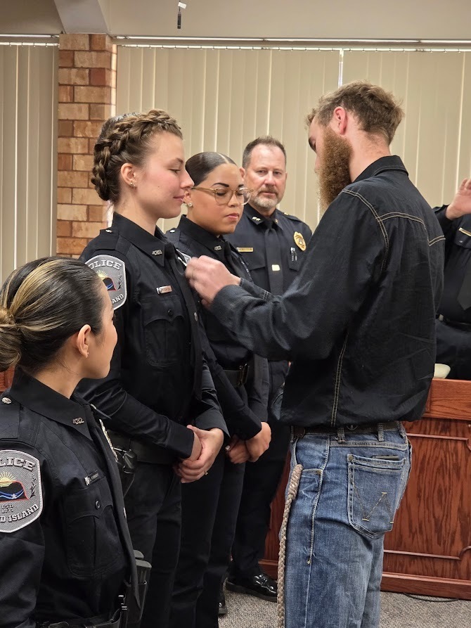 GIPD Administration swearing in four new officers