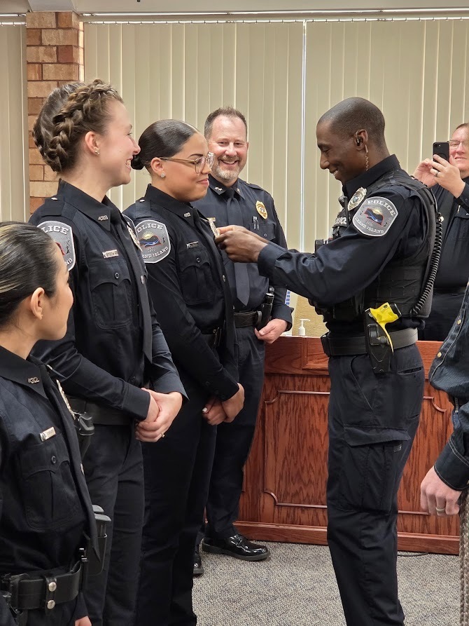 GIPD Administration swearing in four new officers