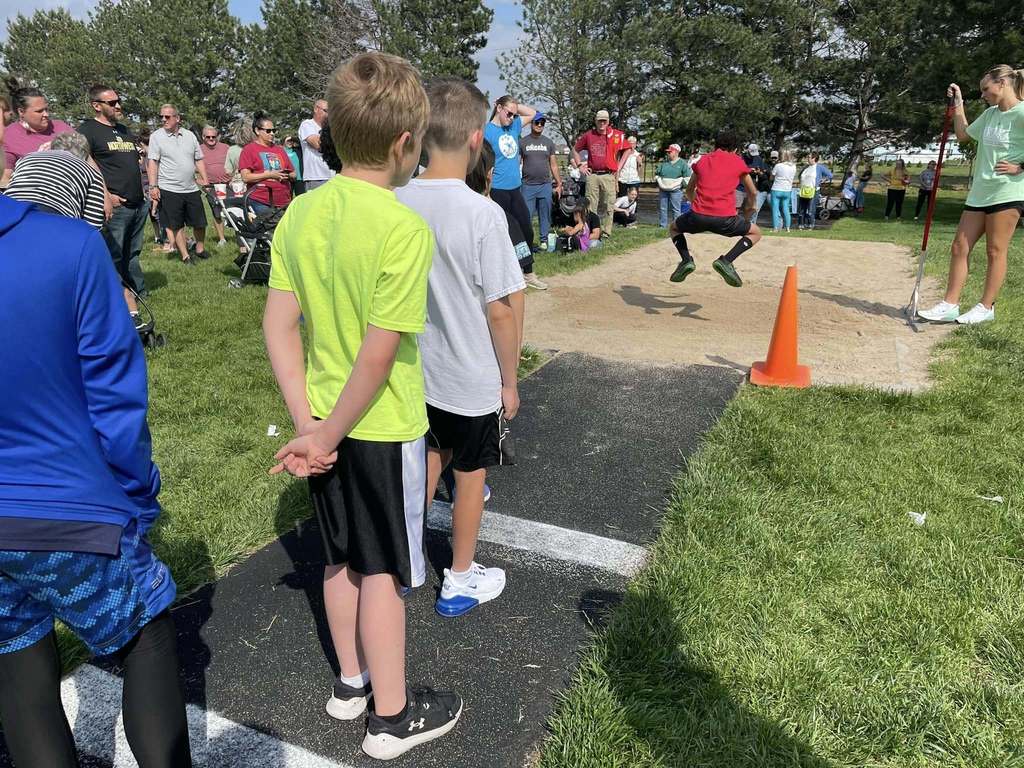 Photo of local youth competing in the Central Nebraska Youth Track and Field Meet