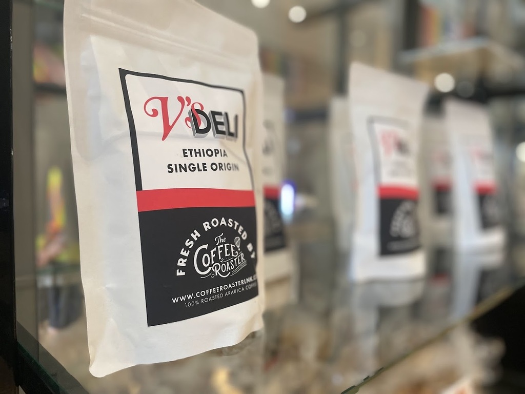 Close-up photo of a bag of coffee at V's Deli