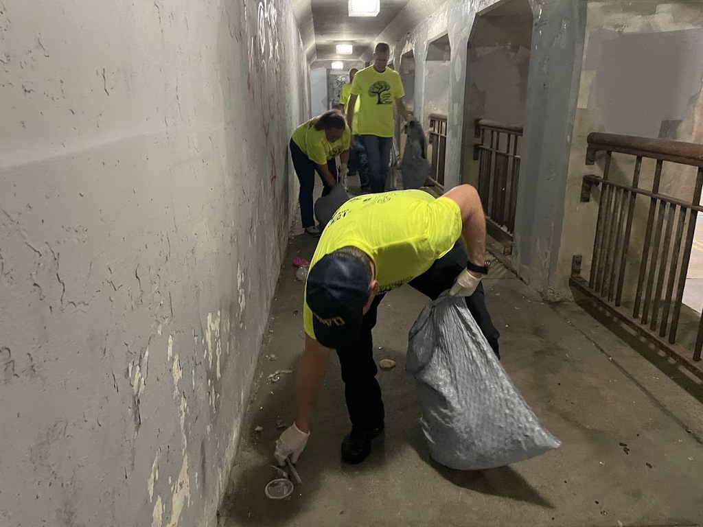 City Staff picking up trash for the annual community-wide clean up day.