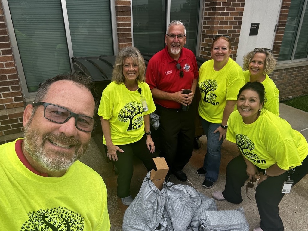 City Staff picking up trash for the annual community-wide clean up day.