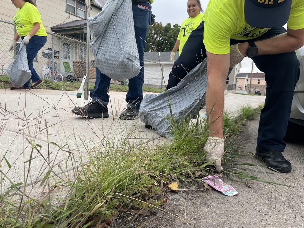 City Staff picking up trash for the annual community-wide clean up day.
