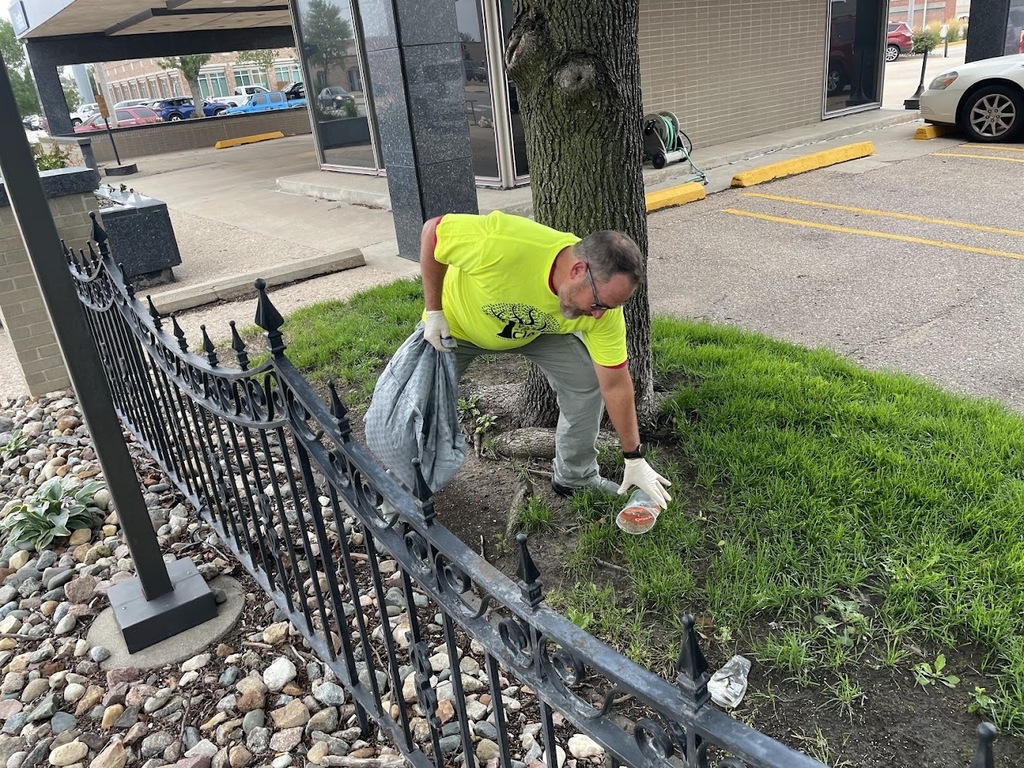 City Staff picking up trash for the annual community-wide clean up day.