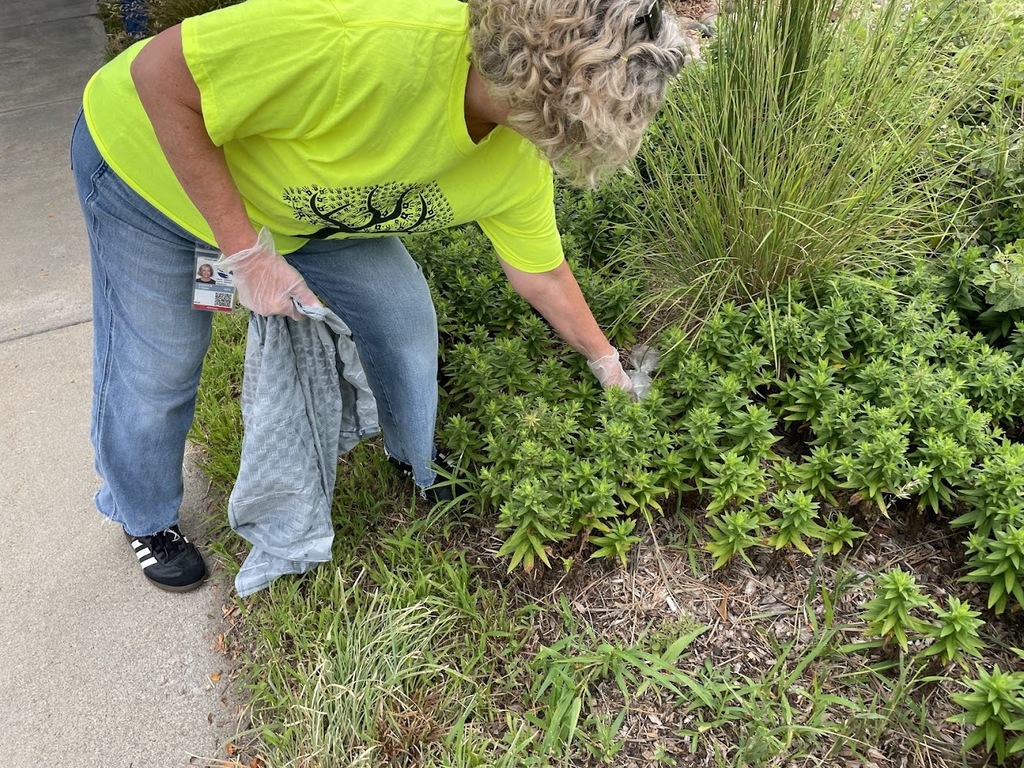 City Staff picking up trash for the annual community-wide clean up day.