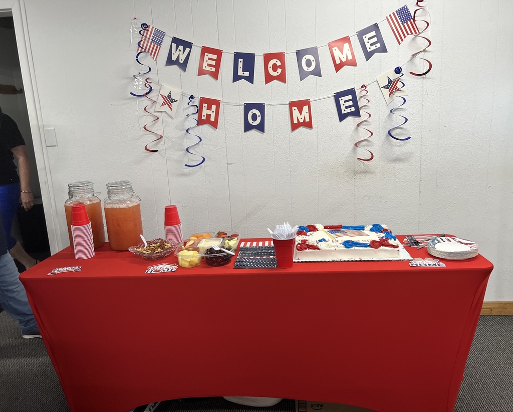 Festive Snack bar with a patriotic red white and blue banner saying welcome home