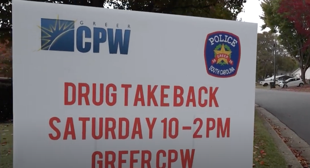 Greer CPW and Greer Police Department logos at the top with the red text that reads Drug Take Back, Saturday 10-2pm, Greer CPW