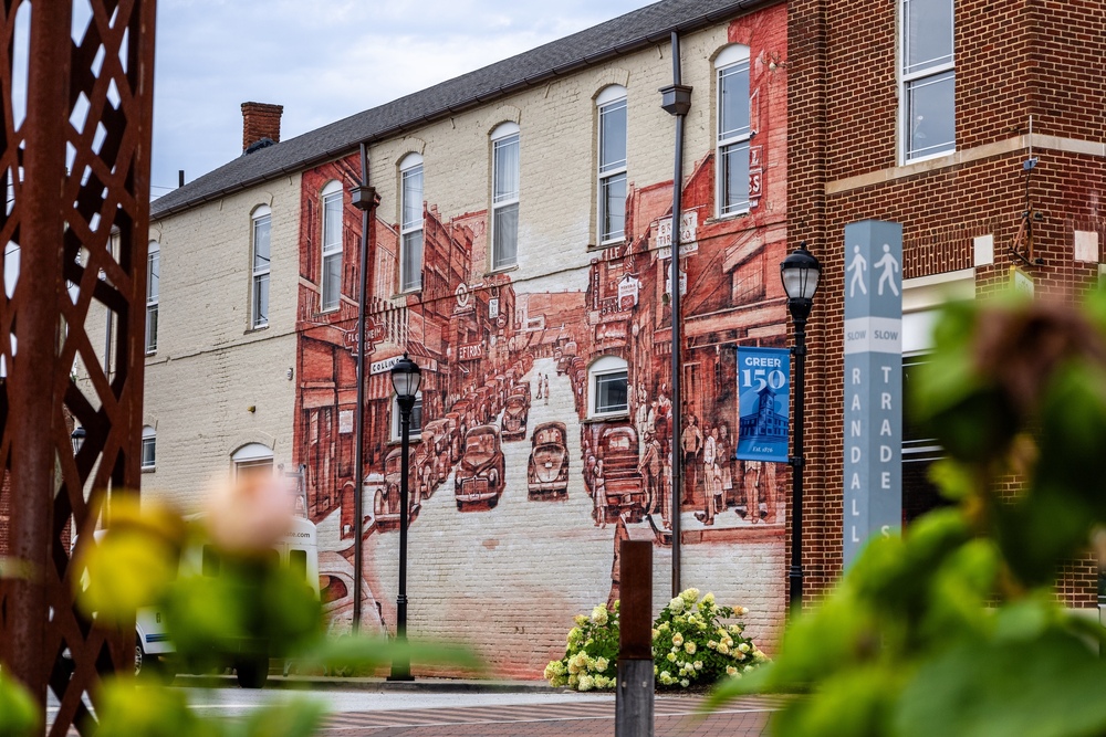 Picture shows mural of a 1940s scene in downtown Greer