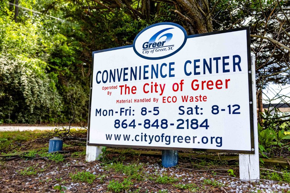 Close up of a sign that reads Convenience Center Operated by the City of Greer
