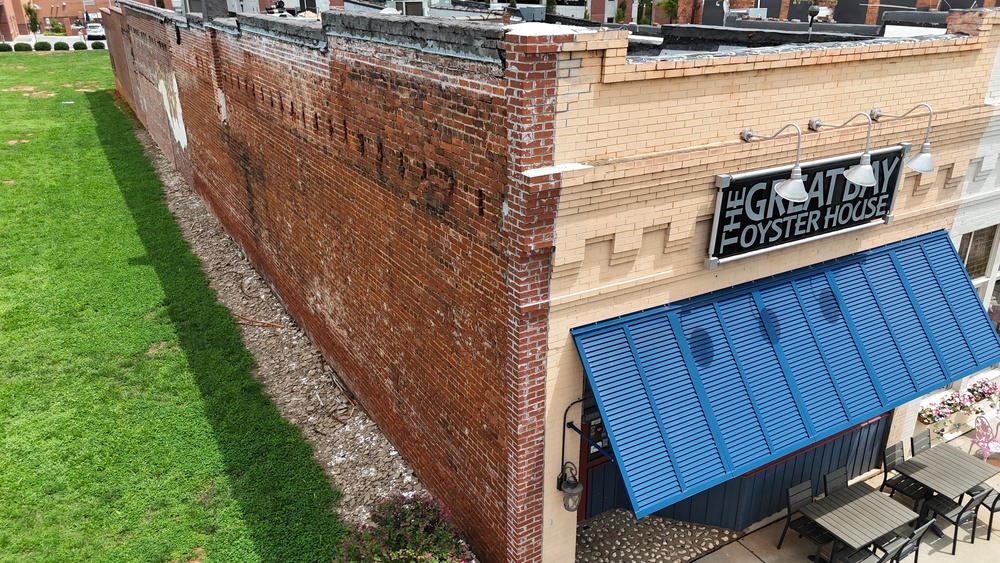 Image shows the front and side of the Great Bay Oyster House building in downtown Greer